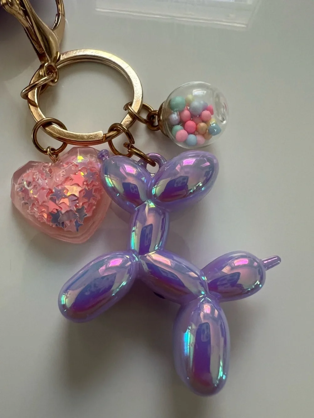 AirPods + Case Purple Floral + Charm Keychain + Purple Earbuds Bundle